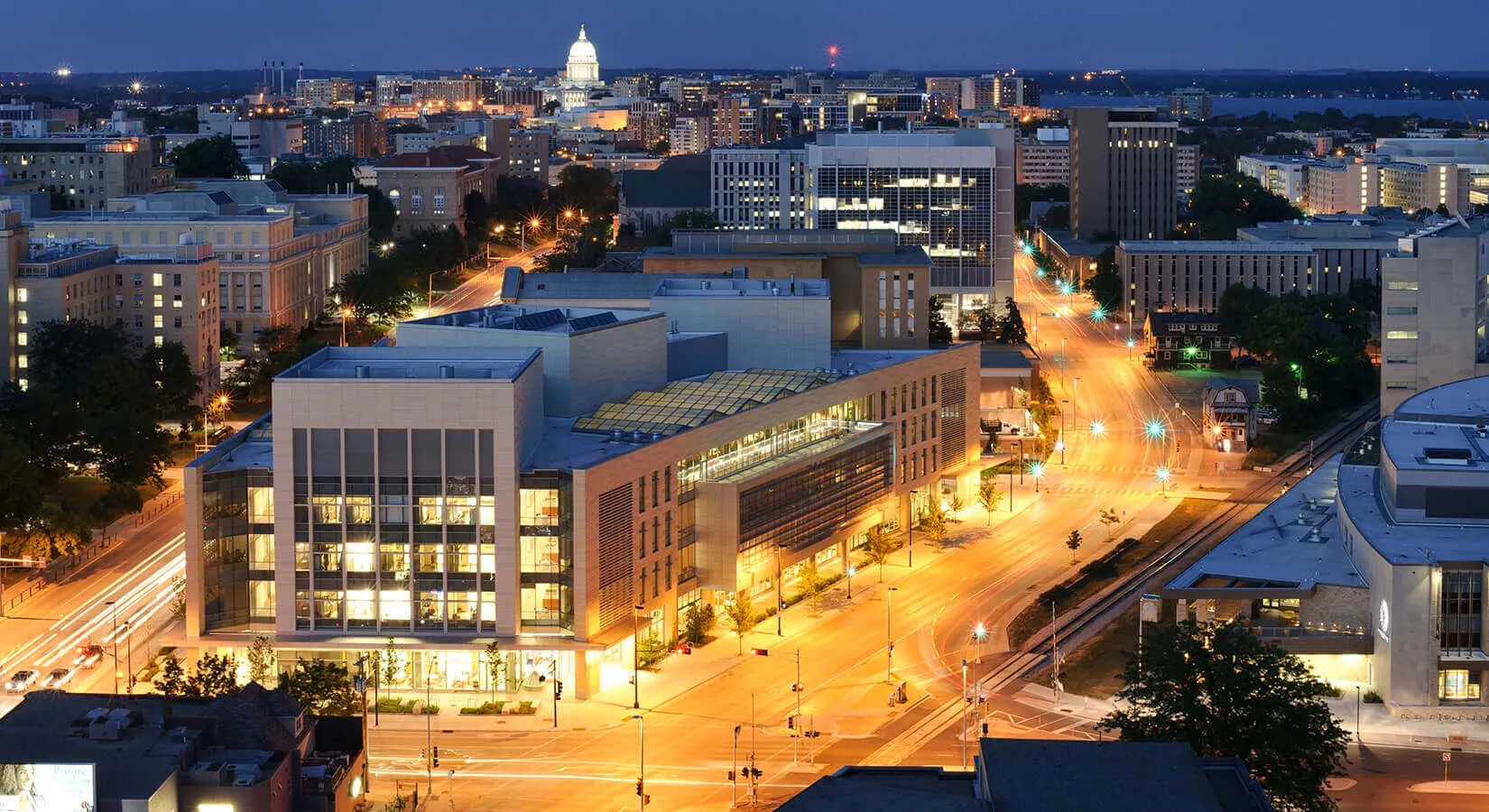 Students on the UW–Madison campus at dusk